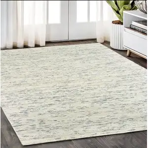 Photo of Ivory And Stone Hand Tufted Area Rug