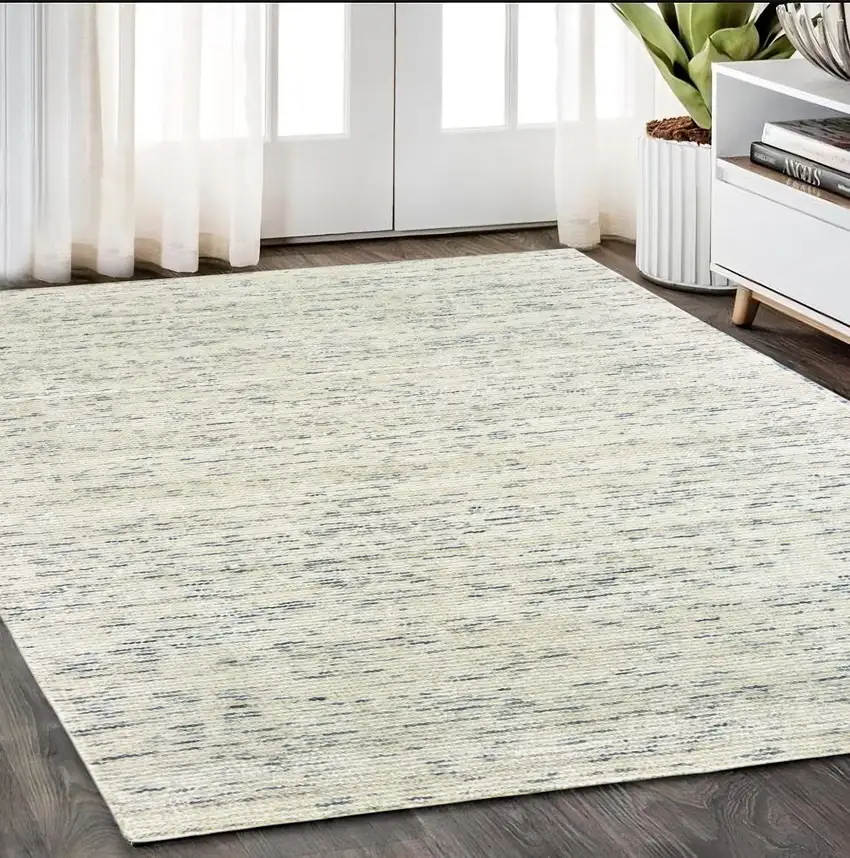 Ivory And Stone Hand Tufted Area Rug Photo 1