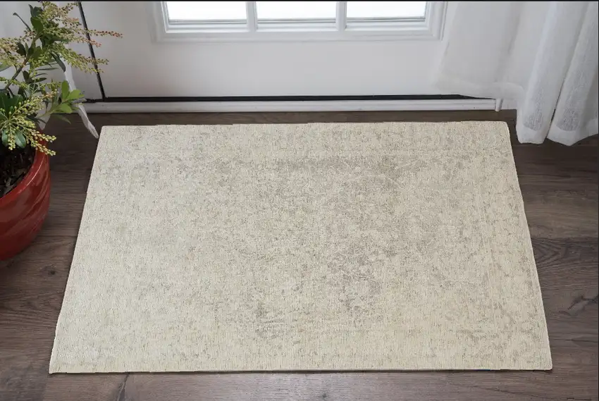 Ivory And Tan Abstract Hand Woven Area Rug Photo 1