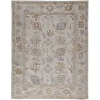 Photo of Ivory And Tan Floral Hand Knotted Stain Resistant Area Rug
