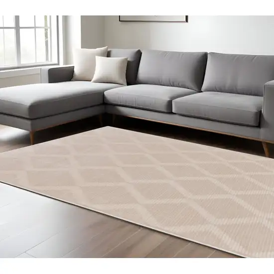 Ivory And Tan Geometric Stain Resistant Area Rug Photo 1