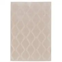 Photo of Ivory And Tan Geometric Stain Resistant Area Rug