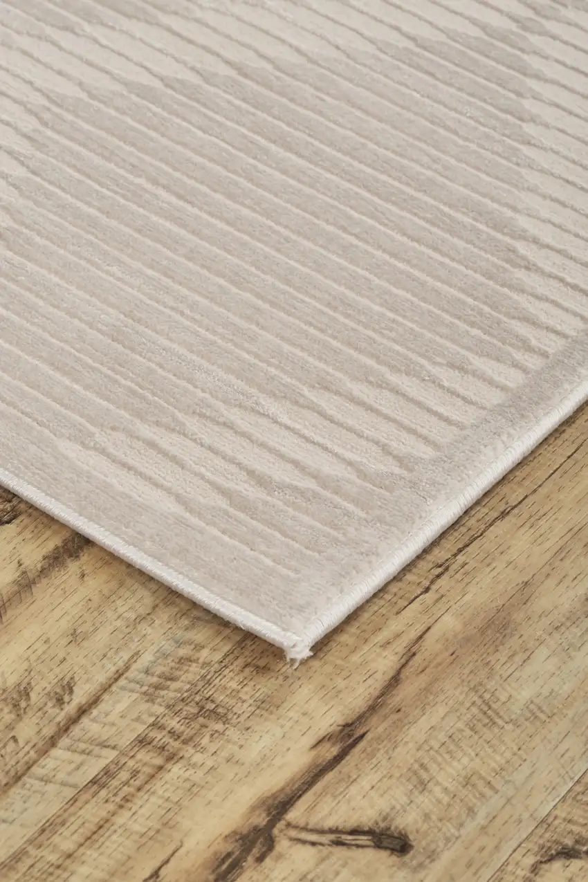 Ivory And Tan Geometric Stain Resistant Area Rug Photo 4