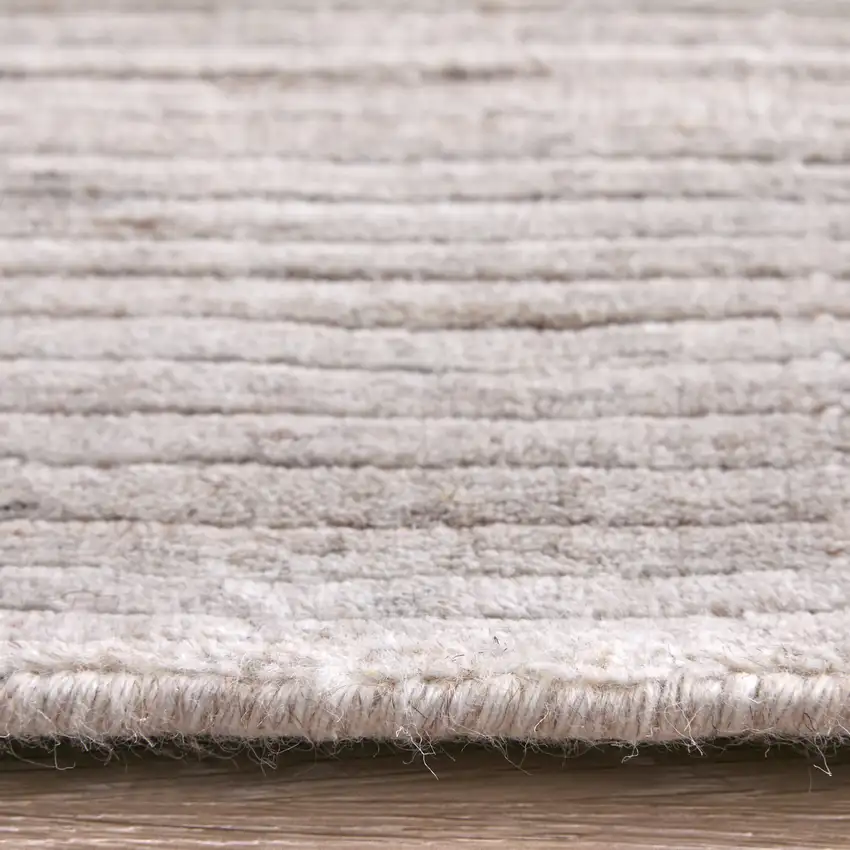 Ivory And Tan Handmade Indoor Outdoor Area Rug Photo 9