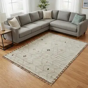 Photo of Ivory And Tan Wool Moroccan Hand Knotted Area Rug
