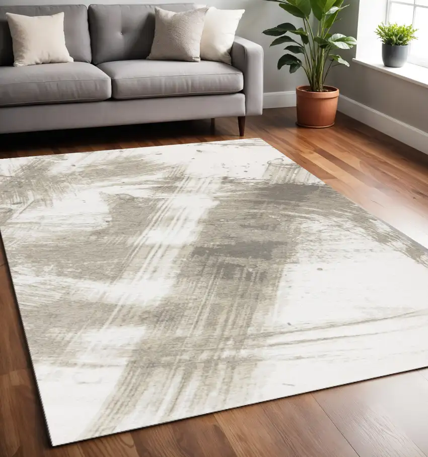 Ivory And Taupe Abstract Area Rug Photo 1