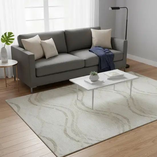 Ivory And Taupe Abstract Washable Area Rug With UV Protection Photo 2