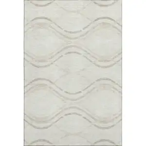 Photo of Ivory And Taupe Abstract Washable Area Rug With UV Protection