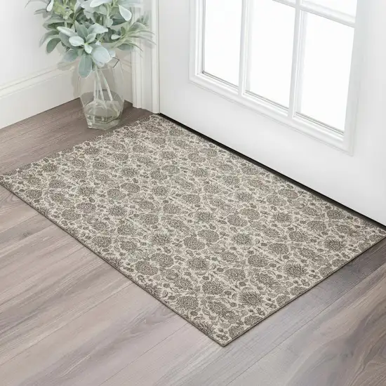 Ivory And Taupe Floral Washable Area Rug With UV Protection Photo 1