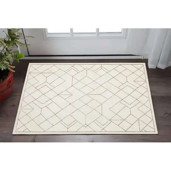 Ivory And Taupe Geometric Area Rug Photo 1