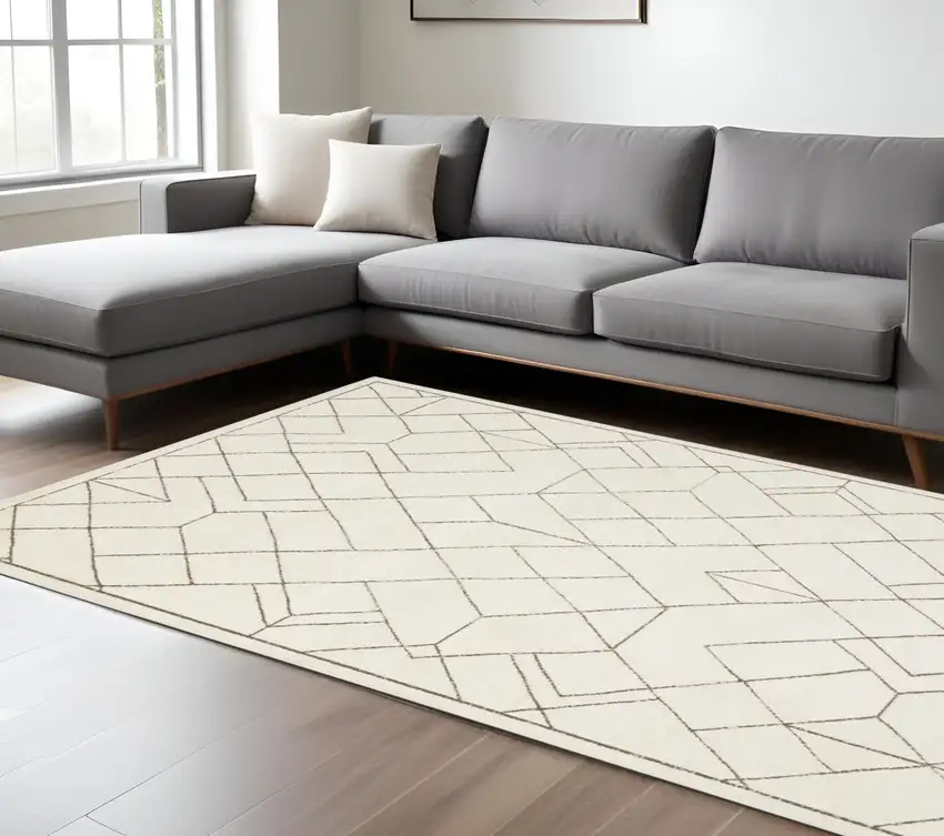 Ivory And Taupe Geometric Area Rug Photo 1