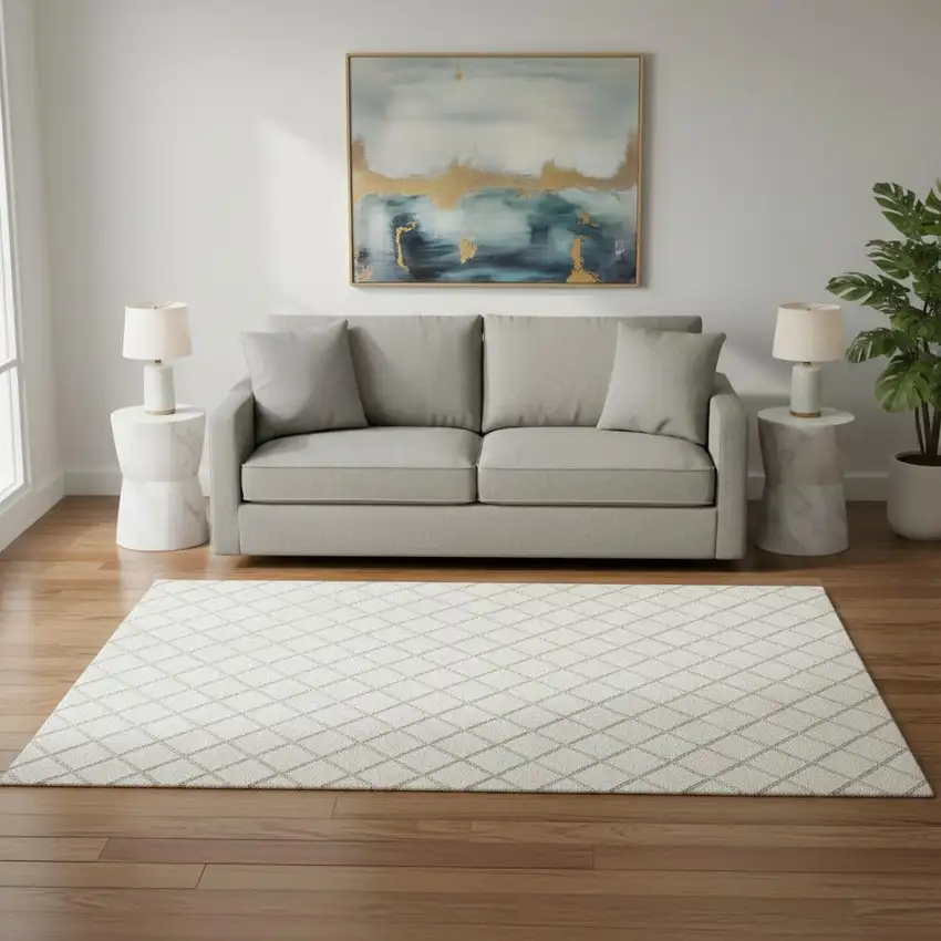 Ivory And Taupe Geometric Washable Area Rug With UV Protection Photo 1