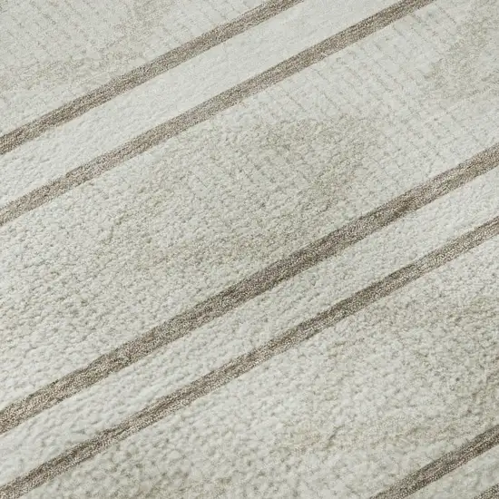 Ivory And Taupe Geometric Washable Area Rug With UV Protection Photo 9