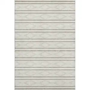Photo of Ivory And Taupe Geometric Washable Area Rug With UV Protection