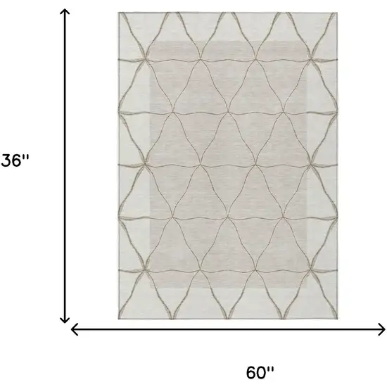 Ivory And Taupe Geometric Washable Indoor Outdoor Area Rug Photo 5