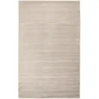 Photo of Ivory And Taupe Hand Woven Distressed Area Rug
