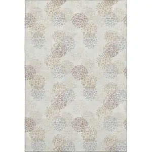 Photo of Ivory And Taupe Polka Dot Washable Area Rug With UV Protection