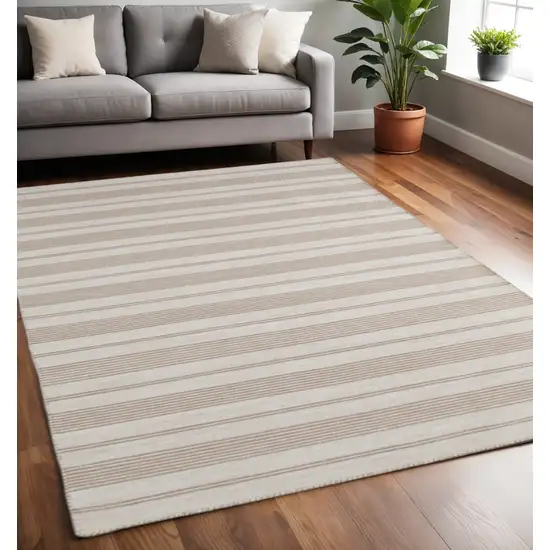 Ivory And Taupe Striped Hand Woven Area Rug Photo 1
