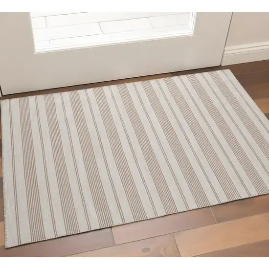 Ivory And Taupe Striped Hand Woven Area Rug Photo 1