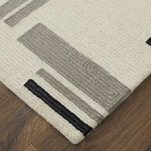 Photo of Ivory And Taupe Wool Abstract Tufted Handmade Area Rug