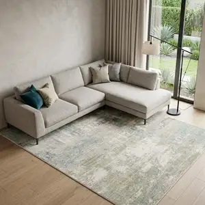 Photo of Ivory And Teal Abstract Area Rug