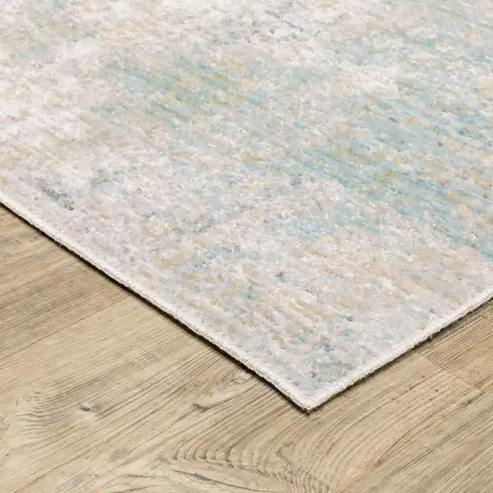 Ivory And Teal Abstract Area Rug Photo 7