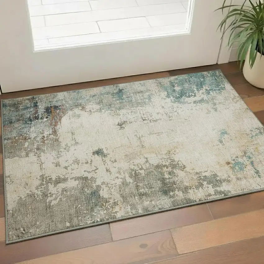 Ivory And Teal Abstract Washable Area Rug With UV Protection Photo 2