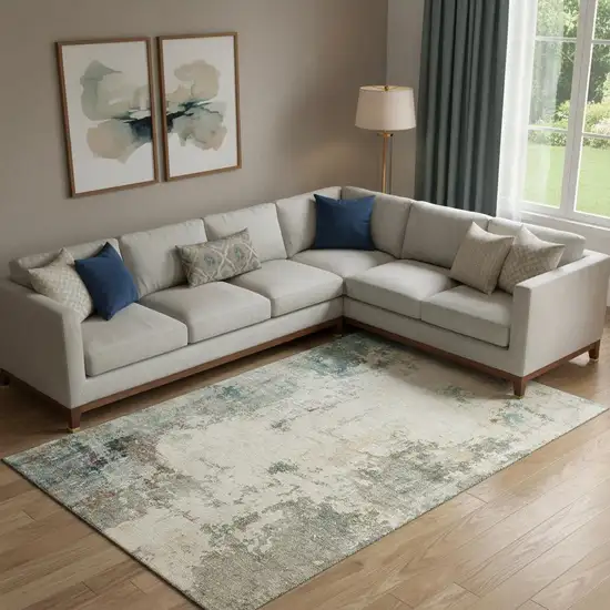 Ivory And Teal Abstract Washable Area Rug With UV Protection Photo 2