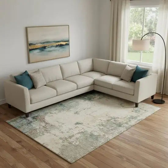 Ivory And Teal Abstract Washable Area Rug With UV Protection Photo 2