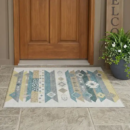 Ivory And Teal Blue Geometric Washable Indoor Outdoor Area Rug Photo 1