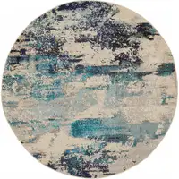 Photo of Ivory And Teal Blue Round Abstract Power Loom Non Skid Area Rug