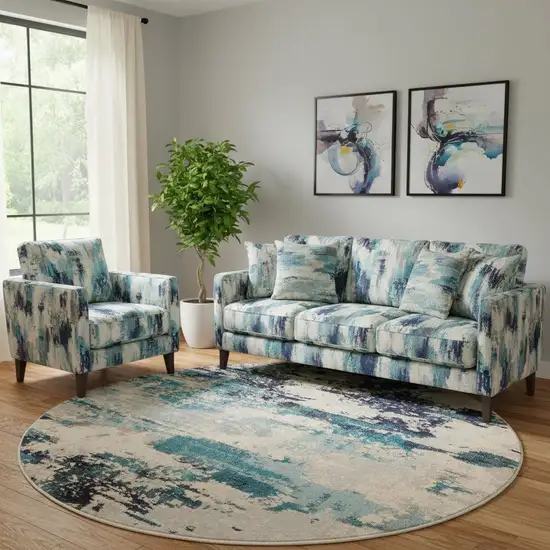 8' X 8' Ivory And Teal Blue Round Abstract Power Loom Non Skid Area Rug Photo 1