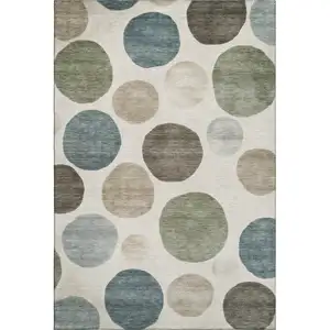 Photo of Ivory And Teal Geometric Washable Area Rug With UV Protection