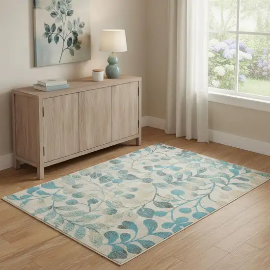 Ivory And Turquoise Botanical Leaves Area Rug Photo 1