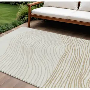 Photo of Ivory And Wheat Striped Washable Indoor Outdoor Area Rug