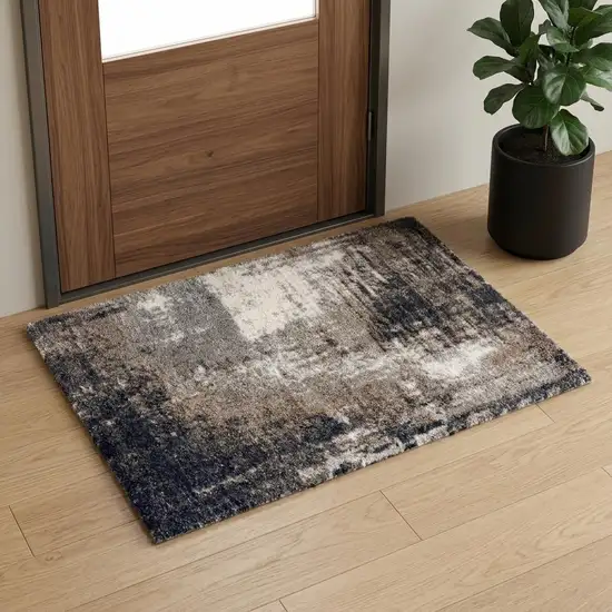 Ivory And White Abstract Area Rug Photo 1