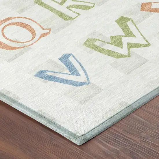 Ivory And White Geometric Washable Indoor Outdoor Area Rug Photo 3