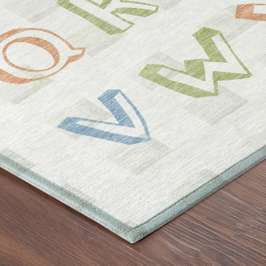 Ivory And White Geometric Washable Indoor Outdoor Area Rug Photo 3