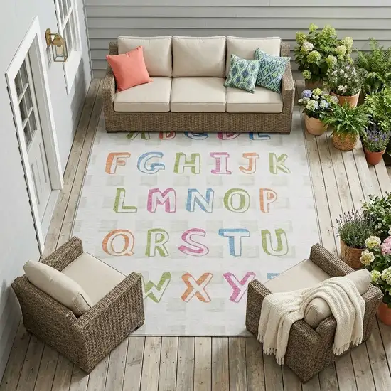 Ivory And White Geometric Washable Indoor Outdoor Area Rug Photo 1