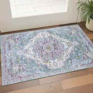 Photo of Ivory Aqua And Purple Medallion Distressed Washable Area Rug