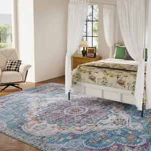 Photo of Ivory Aqua And Purple Medallion Distressed Washable Area Rug