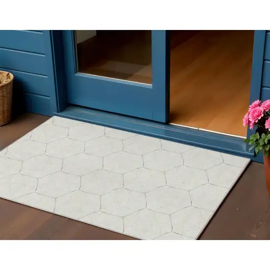 Ivory Beige And Black Geometric Washable Indoor Outdoor Area Rug Photo 1
