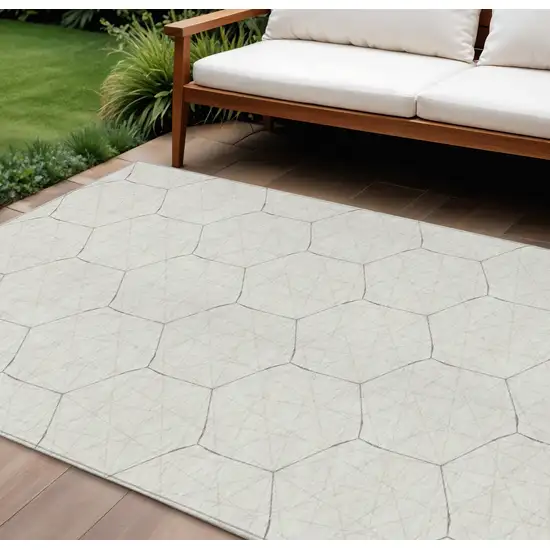 Ivory Beige And Black Geometric Washable Indoor Outdoor Area Rug Photo 1