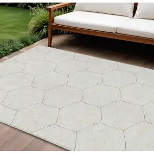 Photo of Ivory Beige And Black Geometric Washable Indoor Outdoor Area Rug
