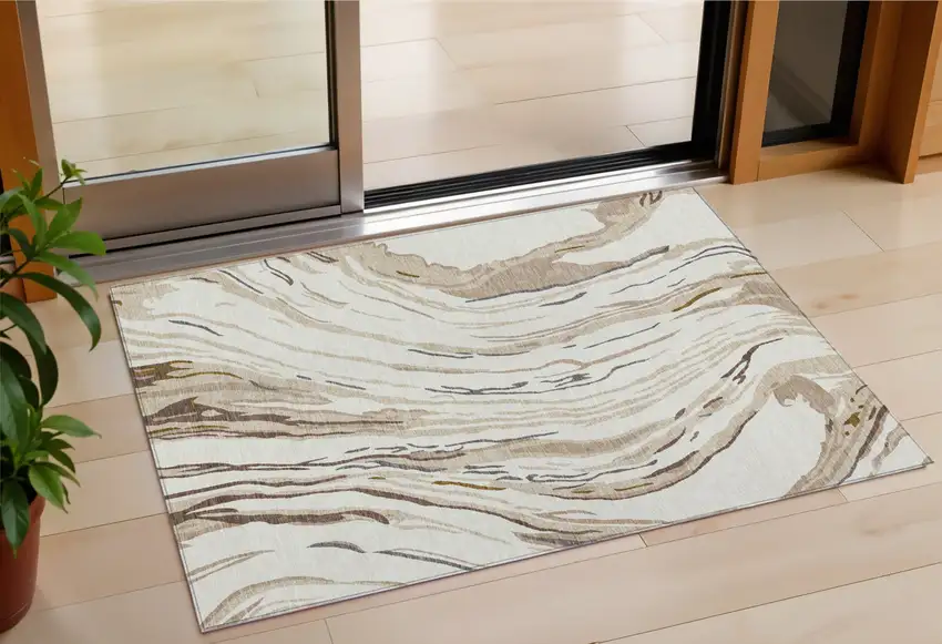 Ivory Beige And Brown Abstract Washable Indoor Outdoor Area Rug Photo 1
