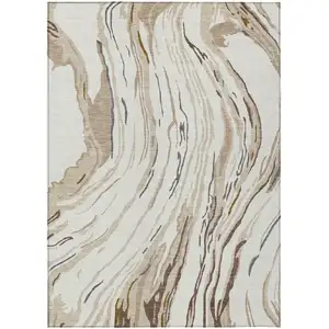 Photo of Ivory Beige And Brown Abstract Washable Indoor Outdoor Area Rug