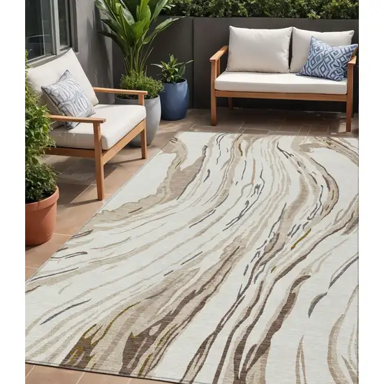 Ivory Beige And Brown Abstract Washable Indoor Outdoor Area Rug Photo 1