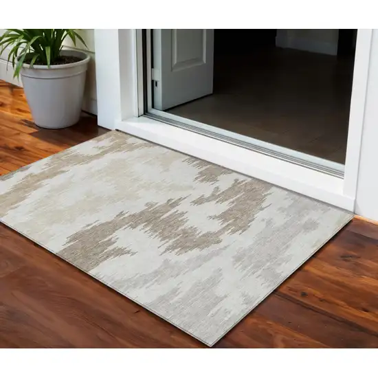 Ivory Beige And Brown Abstract Washable Indoor Outdoor Area Rug Photo 1