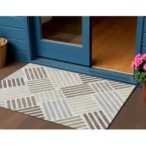 Photo of Ivory Beige And Brown Geometric Washable Indoor Outdoor Area Rug