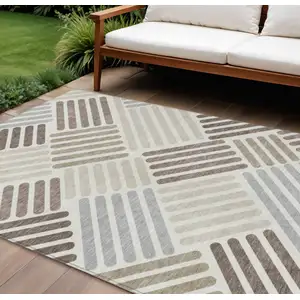 Photo of Ivory Beige And Brown Geometric Washable Indoor Outdoor Area Rug